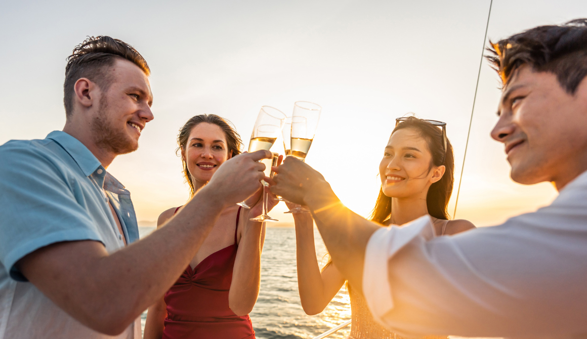 Friends sharing a toast on private boat charter